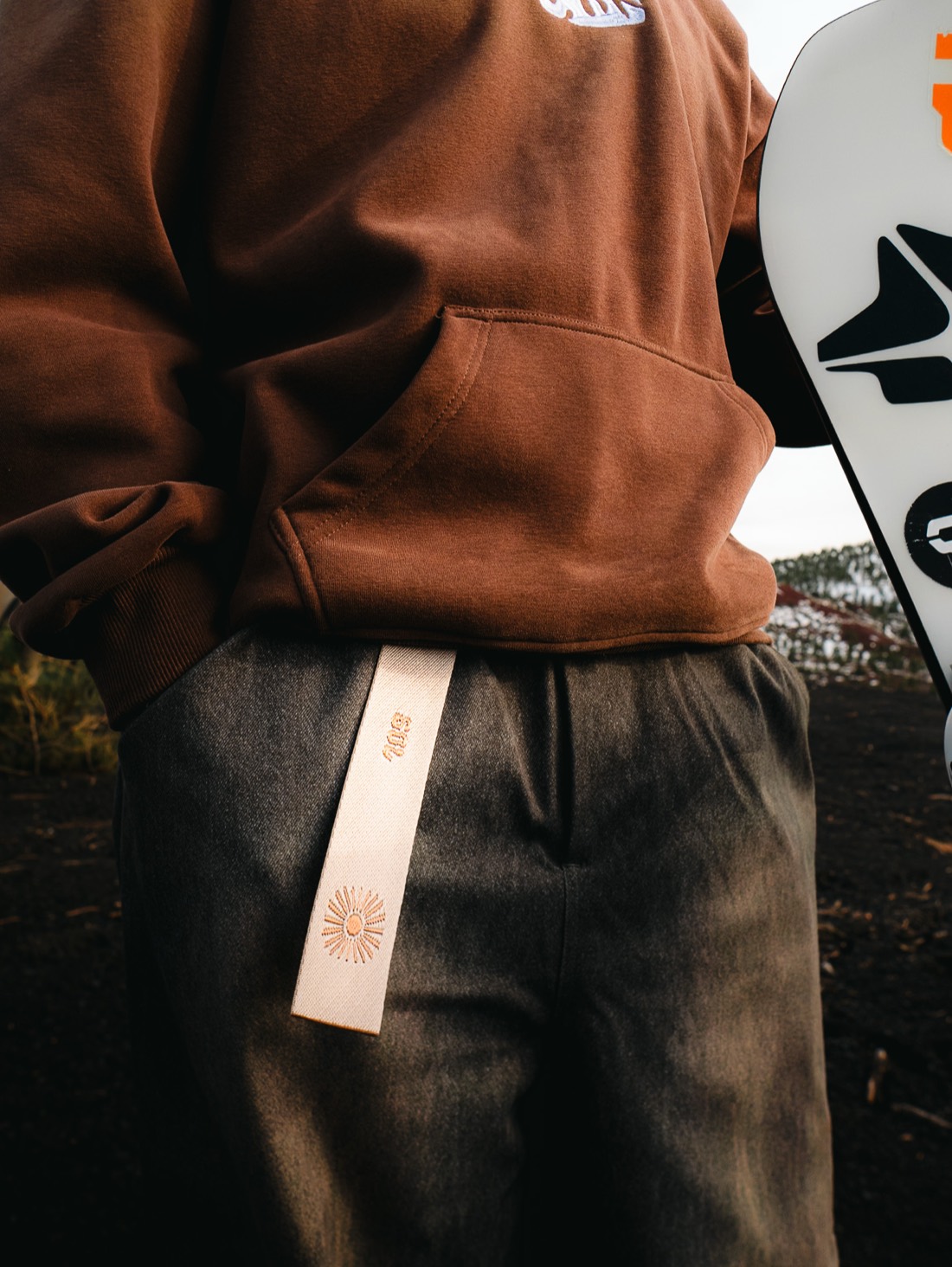 SOL Collection by PRK — brown hoodie and snowboard, Flagstaff