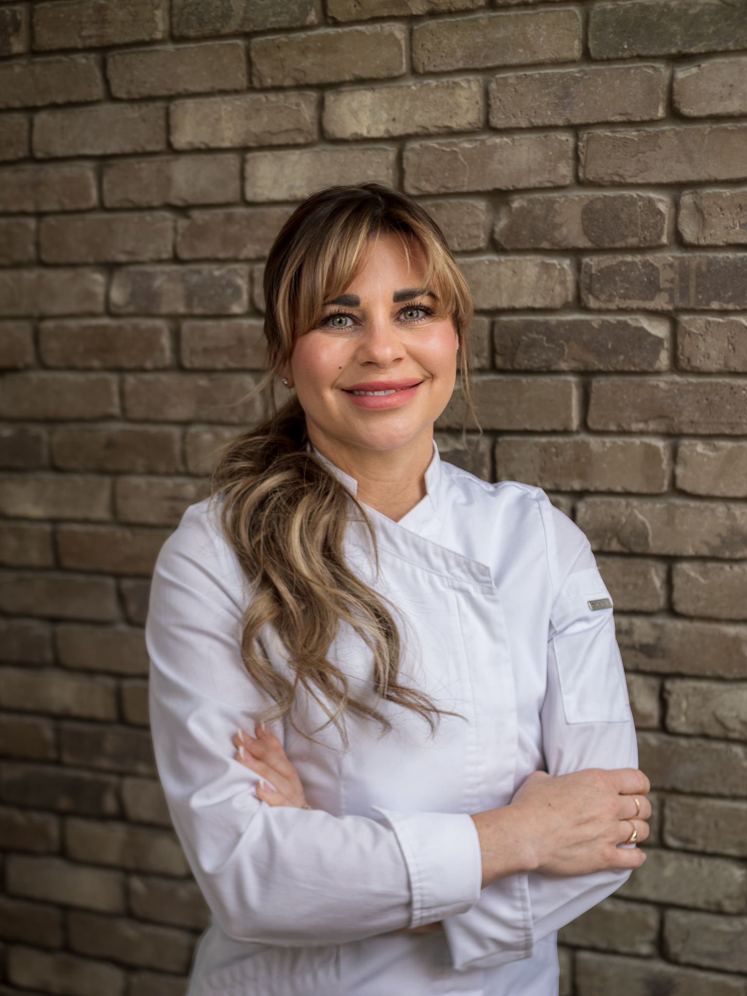Chef Rochelle Daniele in her white chef coat